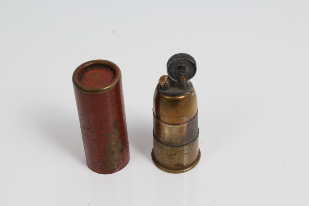 Novelty brass cigarette lighter modelled as an EleyKynoch 16 bore