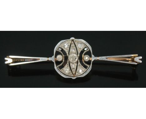 An Art Deco diamond cluster bar brooch, length 47mm, unmarked, gross wt. 4.42g.&nbsp;Condition - good, one of the other stone