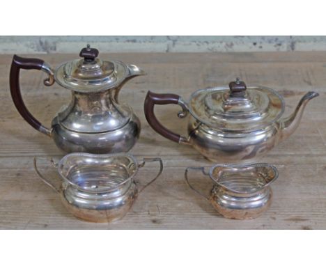 A four piece hallmarked silver tea service, gross wt. 37oz.  