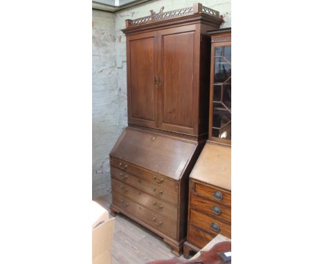 A Georgian Chippendale style mahogany cabinet bureau, width 112cm, depth 63cm &amp; height 236cm.  