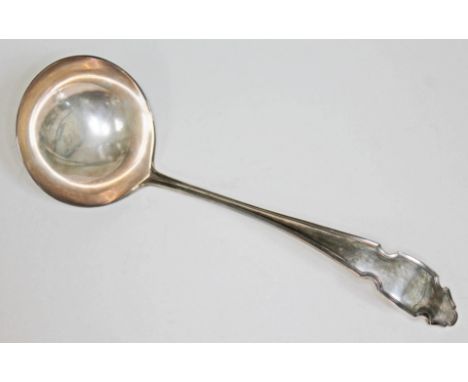 A hallmarked silver ladle, length 26cm, wt. 6 1/2oz.  Condition - good, no damage/repair, minor wear only.