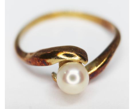 A Danish ring set with a cultured pearl, marked '585', gross wt. 2.17g, size L, with H Behrens "clam" box.  