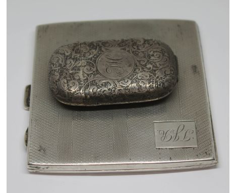 A hallmarked silver Art Deco style cigarette case and a hallmarked silver vesta case, wt. 4oz.  