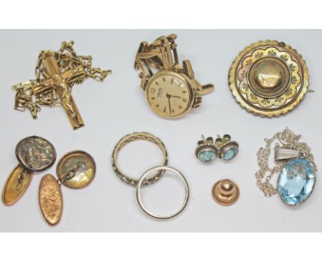 A mixed lot including hallmarked 9ct gold comprising a crucifix pendant on chain, a Majex wristwatch with gold strap and a pa