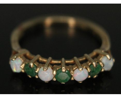 A hallmarked 9ct gold opal and emerald ring, gross wt.  1.86g, size M.  