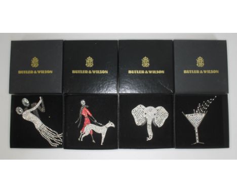 A group of four Butler & Wilson Art Deco style costume brooches comprising a pair of dancers, a lady walking a dog, an elepha