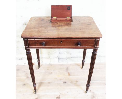 A George III Regency period mahogany chamber writing table attributed to Gillows of Lancaster, circa 1815, the top with inset