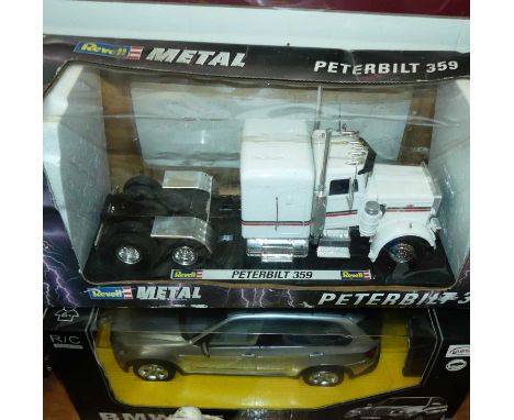 Two boxed of mixed scale diecast and radio-controlled miniatures, to include a Revell Peterbilt 359 tractor unit, and a remot