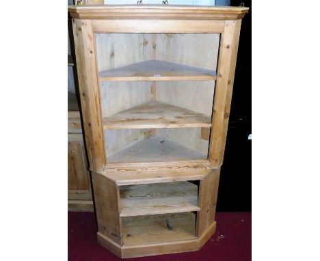 A pine hanging open corner shelf, together with a further similar low corner media unit (2)