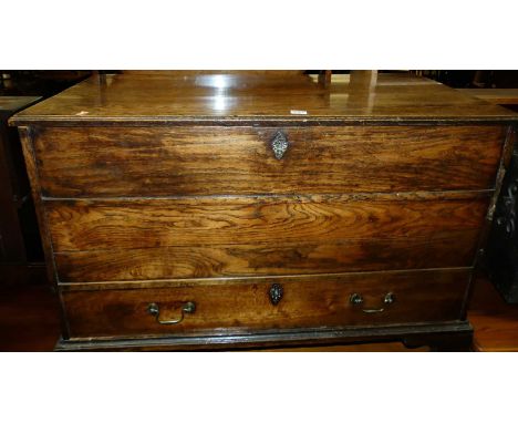 A 19th century provincial elm hinge topped mule chest, having single long lower drawer, on bracket supports, w.100cmCondition