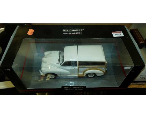 A Minichamps No.137010 1:18 scale model of a Morris Minor Traveller, finished in cream, housed in the original window box 