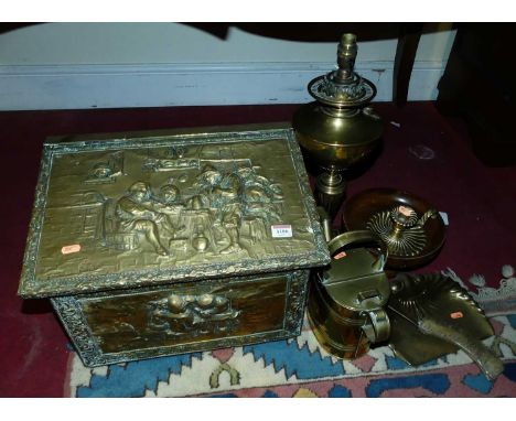A Dutch embossed brass fuel depot, together with a brass oil lamp, brass watering can, oak comport etc (6)