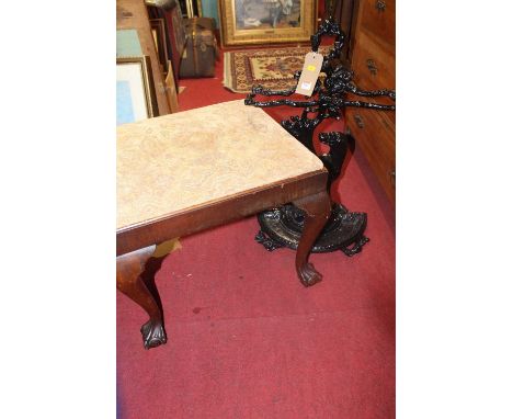 A black painted cast iron twin division stick stand, the column in the form of a seated dog beside tree, height 72cm, togethe