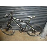 Carrera Vulcan mountain bike in black and green