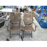 Set of 4 wooden slatted garden armchairs