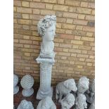 Large concrete Roman bust on column