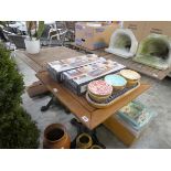 2 square wooden top outdoor tables on cast iron bases