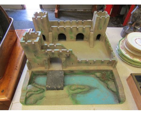 A vintage wooden fort, "Designed, Hand Crafted and Painted by Binns Baker &amp; Co." 
