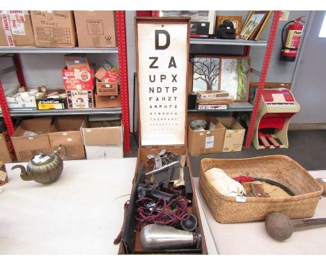 A vintage boxed optician sight testing equipment 