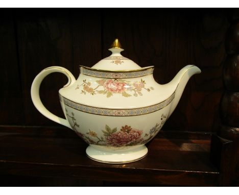 A Royal Doulton 'Canton' pattern teapot, milk jug, sugar bowl and trio 