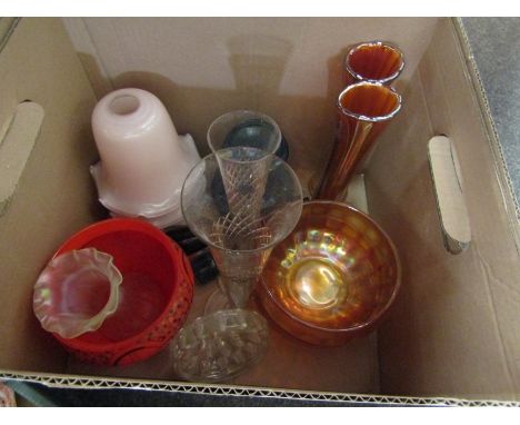 A box of glassware including carnival glass, three pink lamp shades, vases, etc 