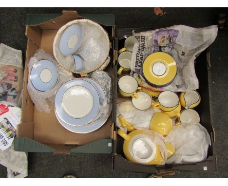 An Italian yellow and blue ground part tea service, a Doulton light blue part dinner service etc 