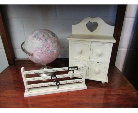 A desk globe, abacus perpetual desk calendar and a rustic bank of drawers (3) 