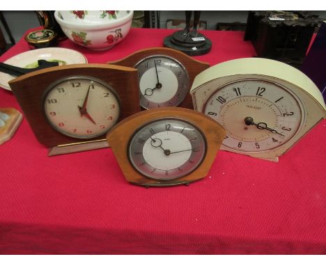 A Thomas Kent kitchen clock and three mantel clocks 