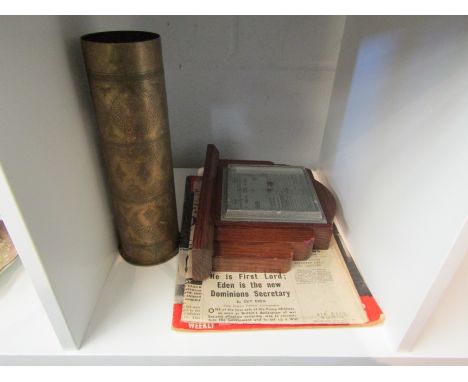 A 1913 German gun shell with Arabic style engraved decoration, height 27.5cm.  Together with a 1939 copy of the Daily Express