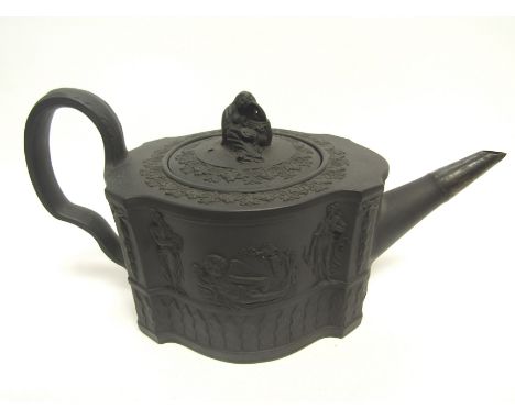 A 19th Century Basalt teapot, thought to be by Turner of Caughley, with "The Connoisseur" letter, 25cm long x 12.5cm tall 