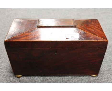 A nineteenth century inlaid mahogany tea caddy, width 29 cm. CONDITION REPORT: Missing glass liner within, perhaps later bun 