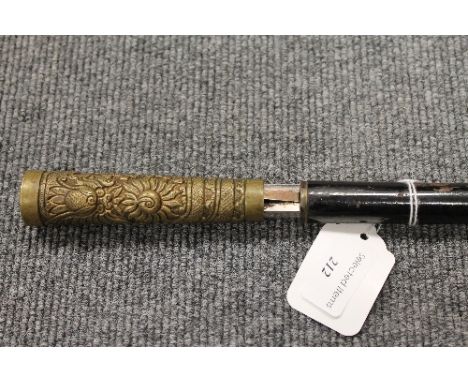 A late Victorian sword stick with brass embossed terminal.  CONDITION REPORT: Good time aged condition. The main stem constru