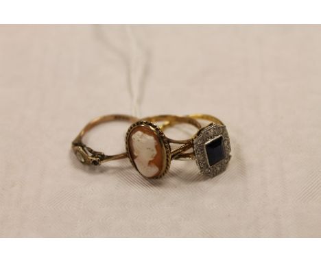 An 18ct gold platinum set diamond and sapphire Art Deco ring, together with two 9ct gold dress rings. (3) CONDITION REPORT: G