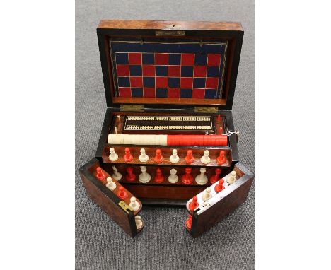An early twentieth century burr yew wood games compendium, with compartmentalised interior, width 33 cm. CONDITION REPORT: Go