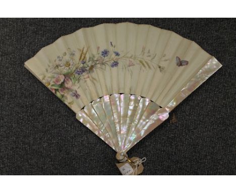 A French silk and mother of pearl fan, boxed. CONDITION REPORT: Good condition, with Paris labels to the box.
