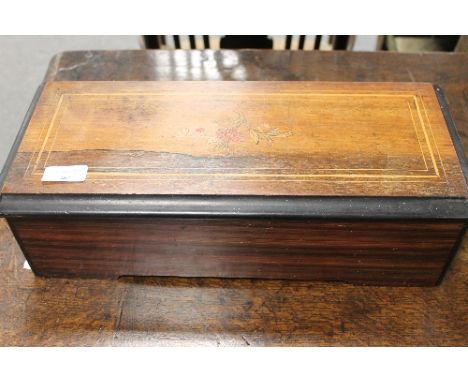 A Victorian inlaid rosewood music box, width 41 cm. CONDITION REPORT: Playing condition, sounds like it requires some attenti