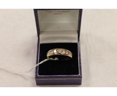 A 14ct gold nine stone diamond ring. CONDITION REPORT: Good condition.