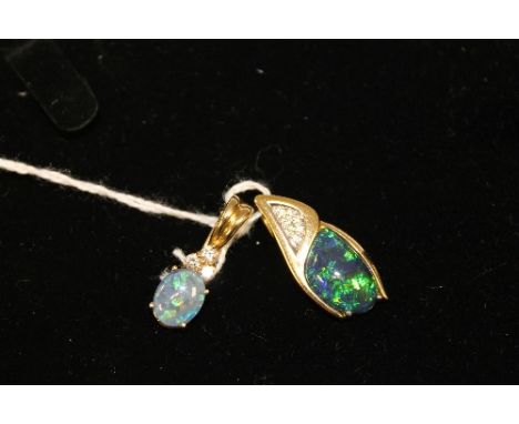 Two 18ct gold opal and diamond pendants. (2) CONDITION REPORT: Good condition. 7.2g gross.