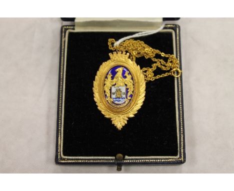 A 9ct gold and enamel Lady's medallion on chain, 21.3g, cased. CONDITION REPORT: The matching medallion to lot 56, the revers