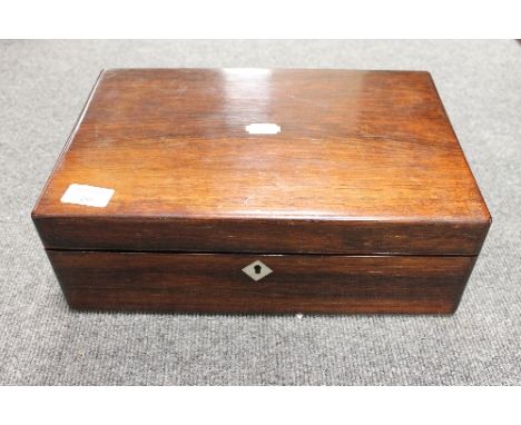 A Victorian rosewood writing box, inlaid with mother of pearl, width 35 cm. CONDITION REPORT: Good condition.