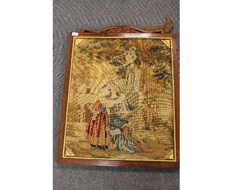 Nineteenth century embroidery panel depicting Lovers by a Statue, 56cm x 68cm, together with another framed tapestry of same 