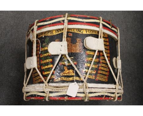 An early twentieth century military drum - First Batallion The Royal Inniskilling Fusiliers, diametre 47.5cm, together with m