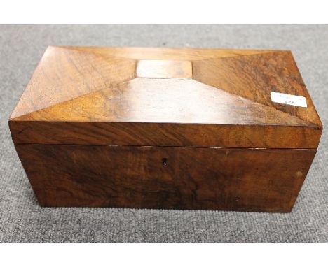 A Victorian burr walnut tea caddy, width 32 cm. CONDITION REPORT: Good condition, missing glass liner mostly fine.