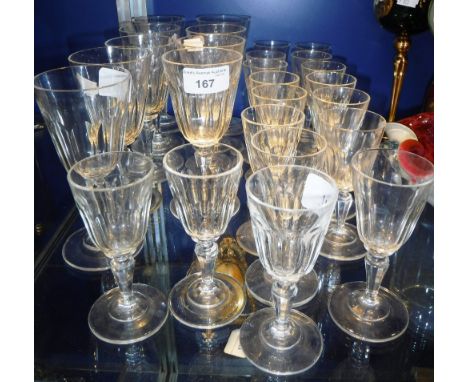 A QUANTITY OF 19TH CENTURY AND SIMILAR WINE GLASSES with panel-cut bodies