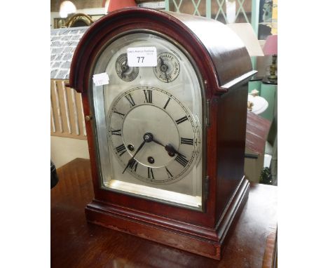 AN EDWARDIAN MAHOGANY CASED BRACKET CLOCK with silvered dial and chiming movement (pendulum in office)