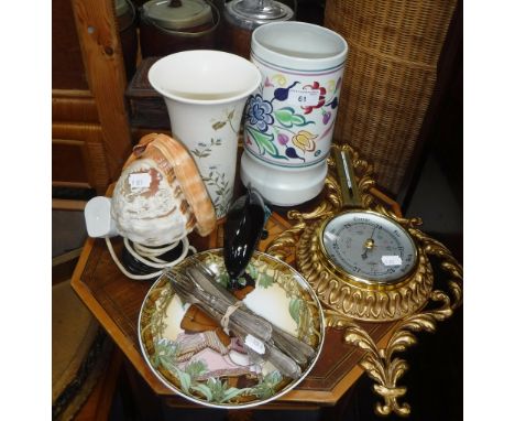 A POOLE POTTERY CYLINDER VASE with traditional decoration, a Poole dolphin, a carved conch shell lamp and similar items