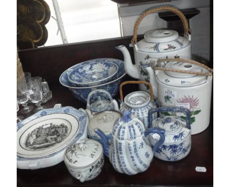 A COLLECTION OF ORIENTAL CERAMIC TEAPOTS, similar blue and white ceramics and two 19th century plates