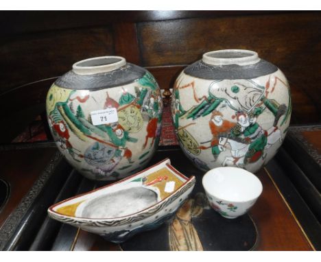 A PAIR OF JAPANESE GINGER JARS decorated with warriors, a similar ceramic boat and a tea bowl (4)