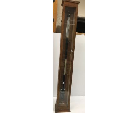 A mid 20th Century Fortin type marine barometer by Philip Harris of Birmingham in glazed oak case No'd 6408 over all height 1