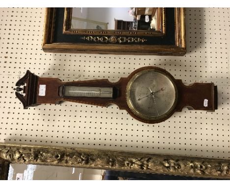 An Edwardian mahogany and inlaid barometer thermometer by Negretti &amp; Zambra of London, No'd. 27509 together with a wrough